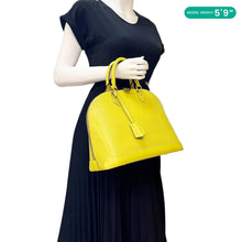 Load image into Gallery viewer, LOUIS VUITTON Alma PM Epi Leather Yellow Satchel Bag - Model Carrying