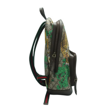 Load image into Gallery viewer, Side angle of GUCCI GG Supreme Backpack in brown