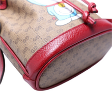 Load image into Gallery viewer, Gucci Doraemon Mini GG Supreme Monogram Bucket Bag Brown
