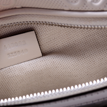 Load image into Gallery viewer, Gucci Embossed GG Leather Pocket Belt Bag Cream
