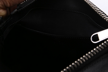 Load image into Gallery viewer,  Fully opened zipper showing the organized interior compartments
