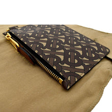 Load image into Gallery viewer, BURBERRY Monogram Coated Canvas Zip Coin Purse Bridle in Brown - Top Left
