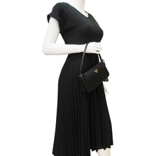 Load image into Gallery viewer, Prada Accessory Pouch Nylon Hobo Bag Black – Model holding
