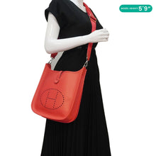 Load image into Gallery viewer, HERMES Evelyne III PM Taurillon Leather Crossbody Bag Orange Poppy
