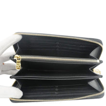 Load image into Gallery viewer, LOUIS VUITTON Coussin Embossed Leather Zippy Wallet Black
