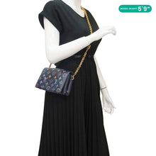 Load image into Gallery viewer, LOUIS VUITTON Coussin Pochette Garden Embossed Leather Crossbody Bag Navy Blue
