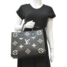 Load image into Gallery viewer, LOUIS VUITTON Onthego MM Giant Monogram Empreinte Leather Tote Bag Bicolor
