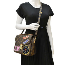 Load image into Gallery viewer, LOUIS VUITTON luxury metis Pochette Crossbody Bag Brown with body view
