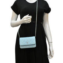 Load image into Gallery viewer, CHANEL WOC Quilted Leather Crossbody Bag Tiffany Blue dummy look
