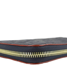 Load image into Gallery viewer, LOUIS VUITTON Clemence Monogram Empreinte Leather Wallet Navy Blue
