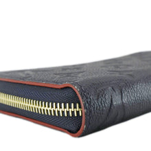 Load image into Gallery viewer, LOUIS VUITTON Clemence Monogram Empreinte Leather Wallet Navy Blue
