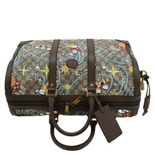 Load image into Gallery viewer, GUCCI Disney x Donald Duck GG Supreme Canvas Duffle Travel Bag Beige upper look
