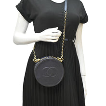 Load image into Gallery viewer, CHANEL Navy Glazed Round As Earth Leather Crossbody Bag with body view
