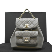 Load image into Gallery viewer, CHANEL Gray leather backpack with gold chain
