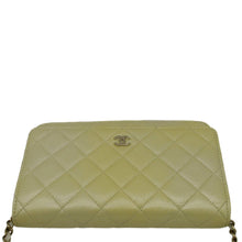 Load image into Gallery viewer, CHANEL WOC Quilted Leather Crossbody Bag Light Green top look
