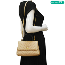 Load image into Gallery viewer, CHANEL Coco Handle Chevron Leather Crossbody Bag Beige
