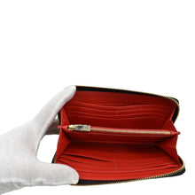 Load image into Gallery viewer, CHRISTIAN LOUBOUTIN Panettone Studded Leather Zippy Wallet Black
