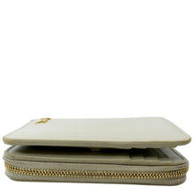 Load image into Gallery viewer, YVES SAINT LAURENT Tiny Monogram Compact Leather Zip Around Wallet White
